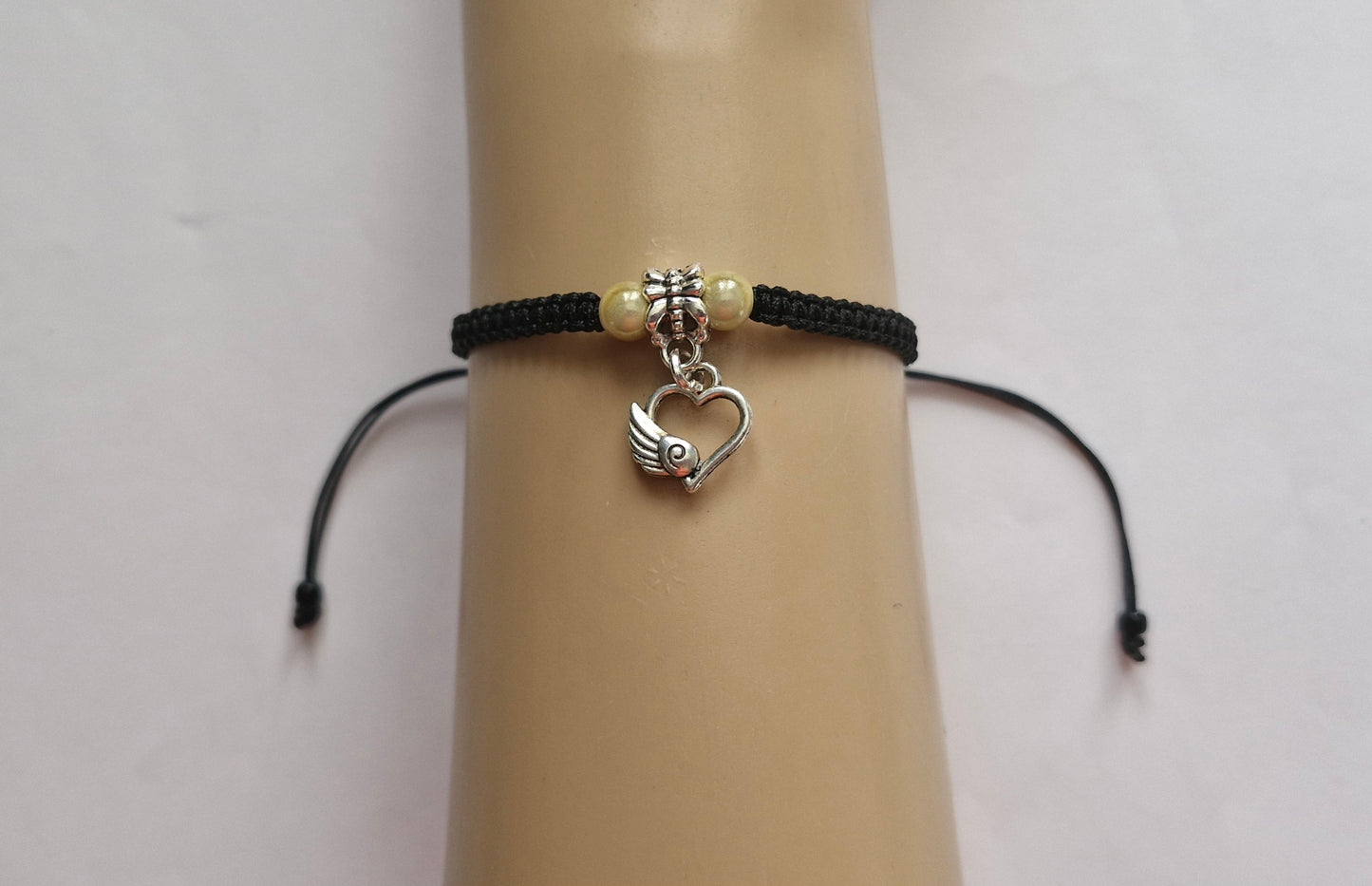 Winged heart bracelet