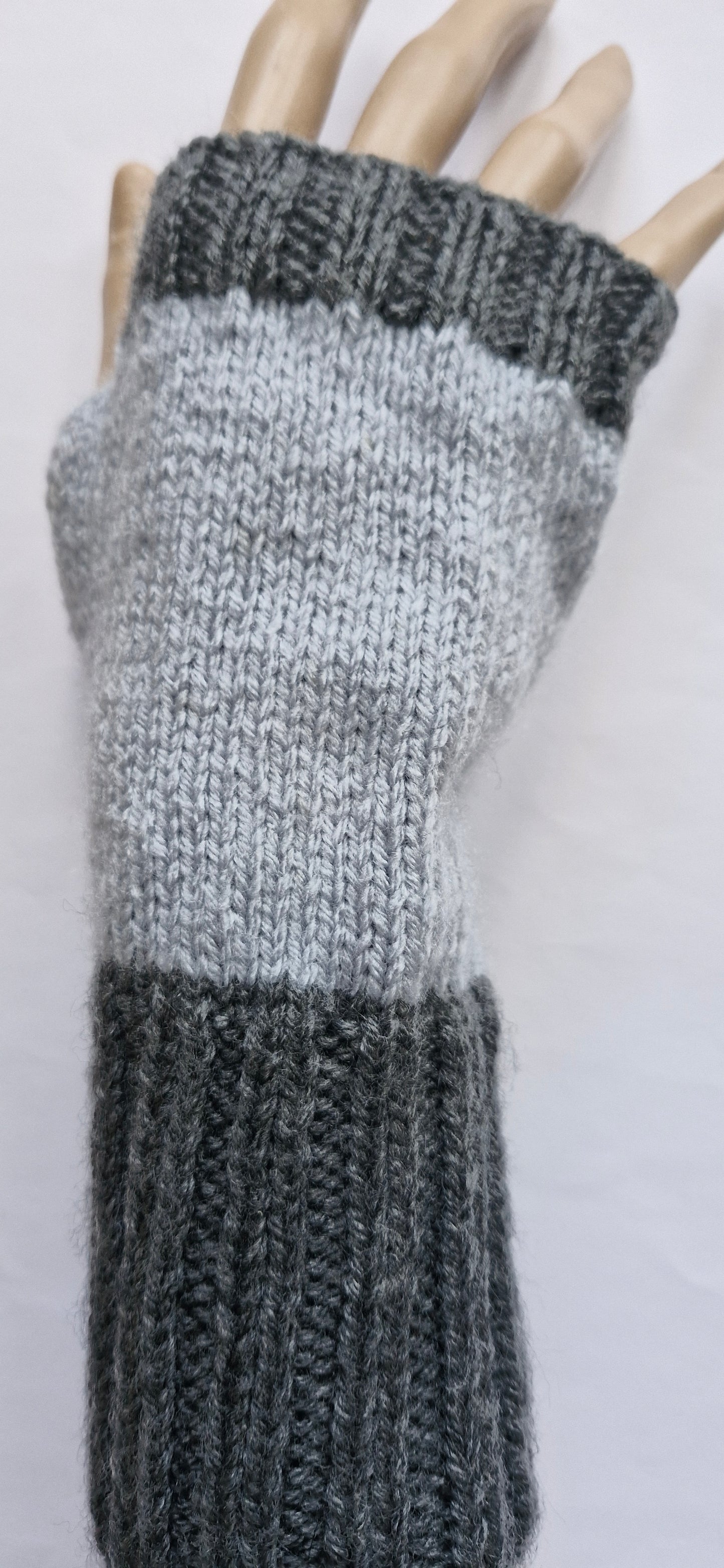 Grey fingerless gloves