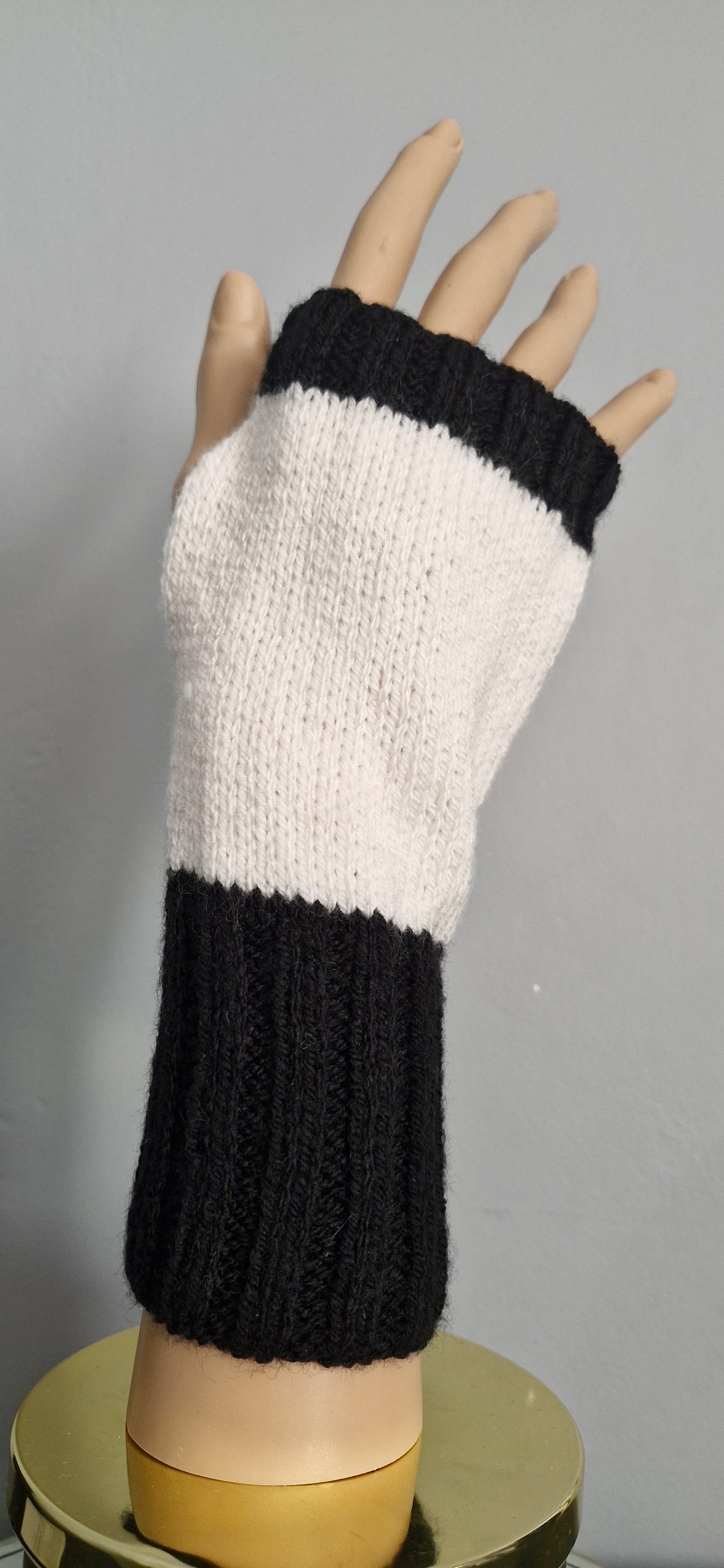 Black and white fingerless gloves