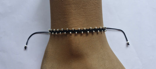 Black and silver anklet