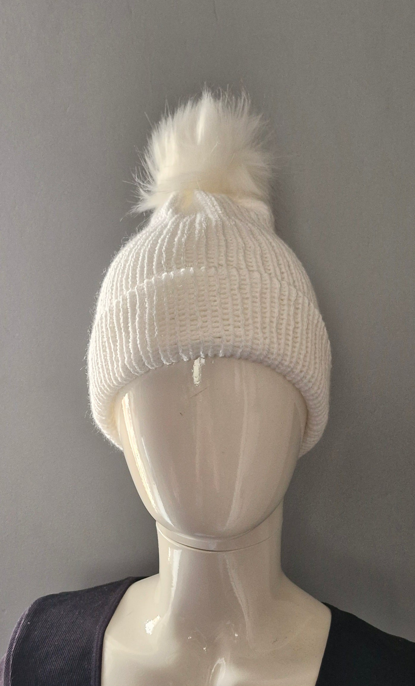 White pom pom beanie hat