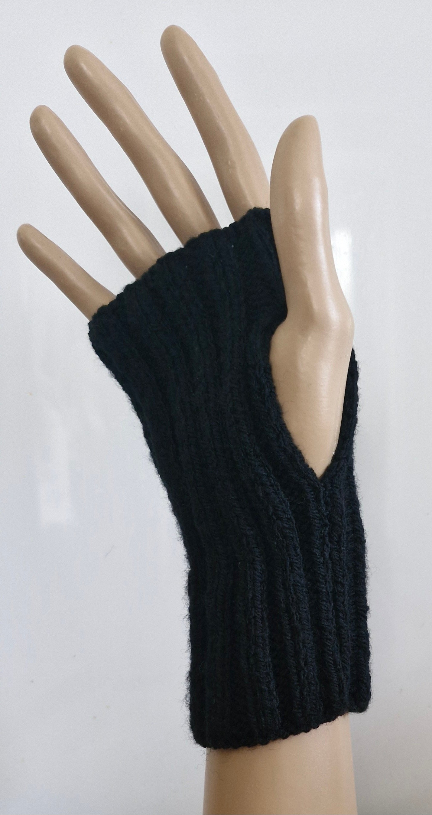 Black ribbed fingerless gloves
